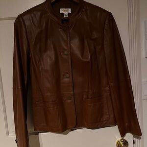 Women’s Leather Jacket Size 10 Petite – never worn.